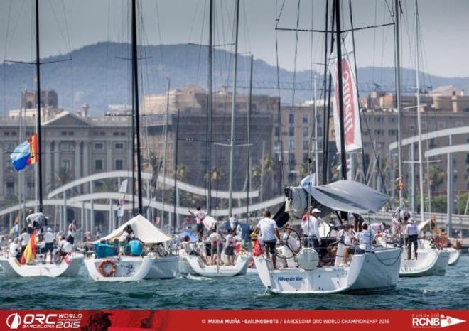 The ORC Worlds fleet returns to Port Vell with no wind in sight - 2015 ORC World Championship © Maria Muina / RCNB
